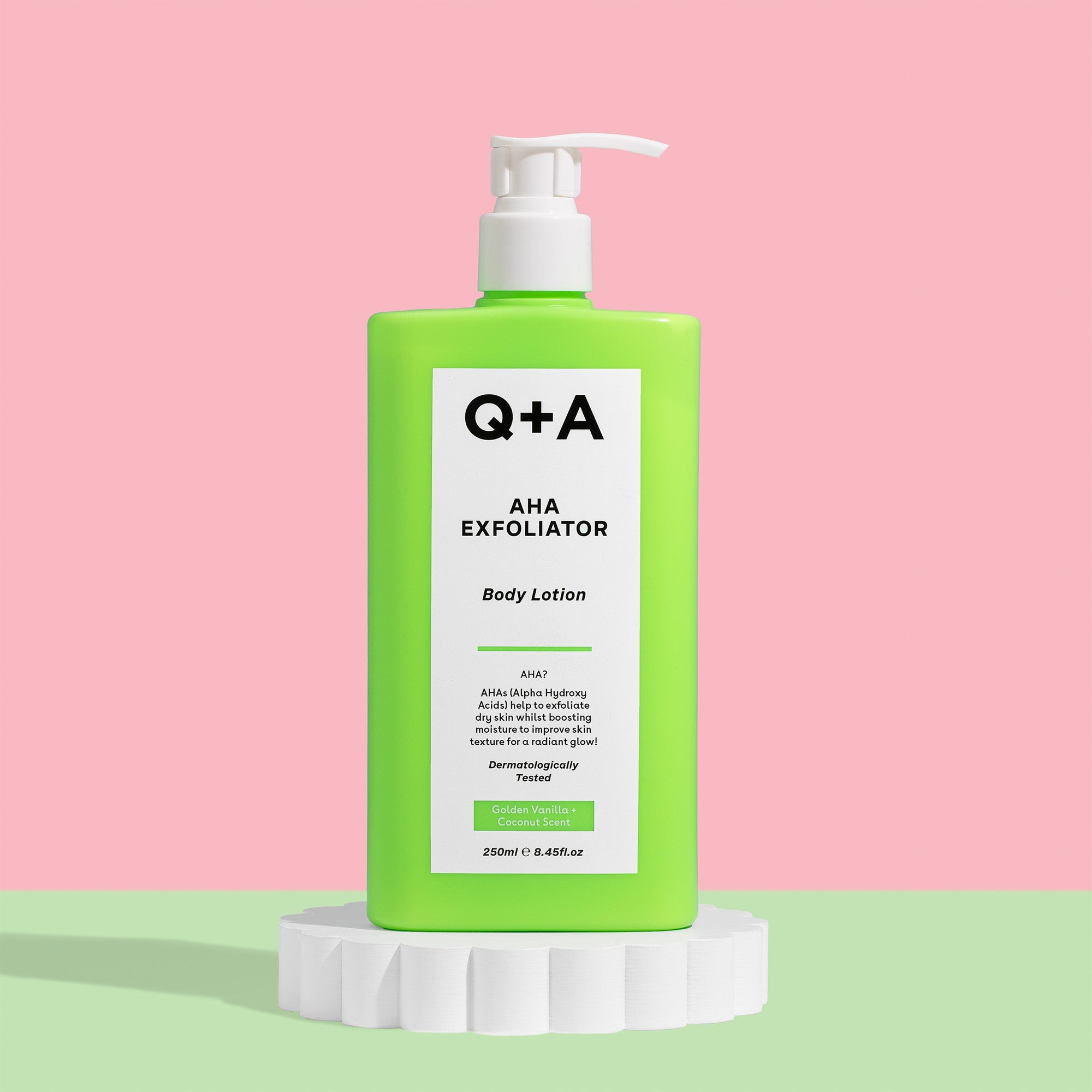 green pump bottle or Q+A AHA Exfoliator Body Lotion on stand
