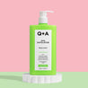 green pump bottle or Q+A AHA Exfoliator Body Lotion on stand
